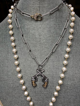 Load image into Gallery viewer, Pictured with the Belle Star Necklace