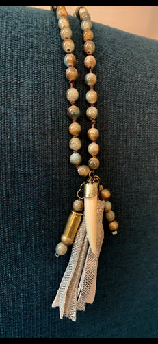 Hand Strung Beaded Necklace with Leather Tassel and Bullet