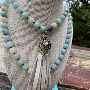 Handmade Beaded Necklace with Leather Tassel